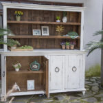 Elegant china cabinet and barrister bookcase showcasing glass panels, wooden shelves, and a timeless design, ideal for displaying decor or organizing books and files.